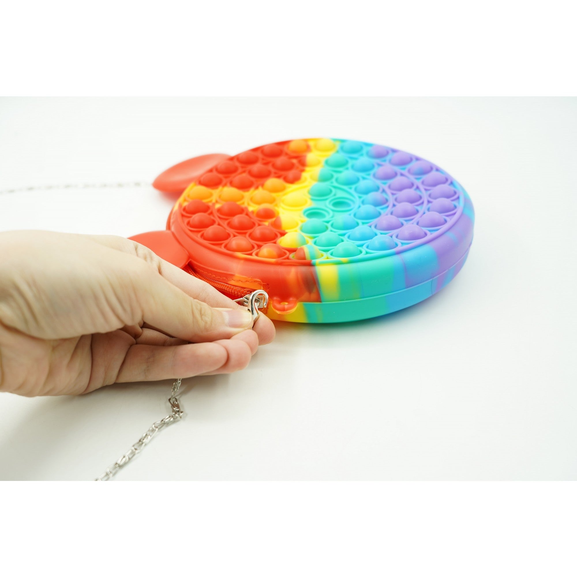 Jucărie antistres Pop‑It flip‑it din silicon – model geantă multicoloră