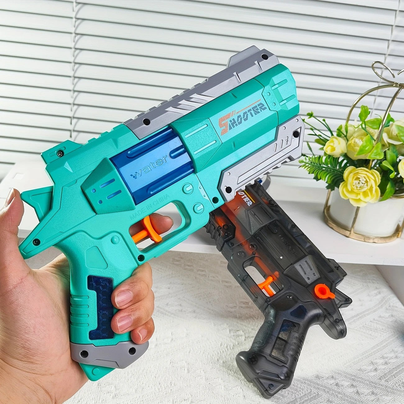 Pistol cu apă pentru copii – jucărie manuală sigură, design modern, 23 cm, verde