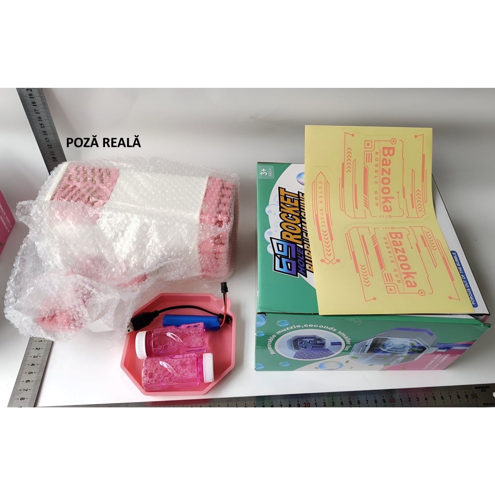 Pistol de bule de săpun cu 69 găuri și lumini colorate – 24 cm, roz