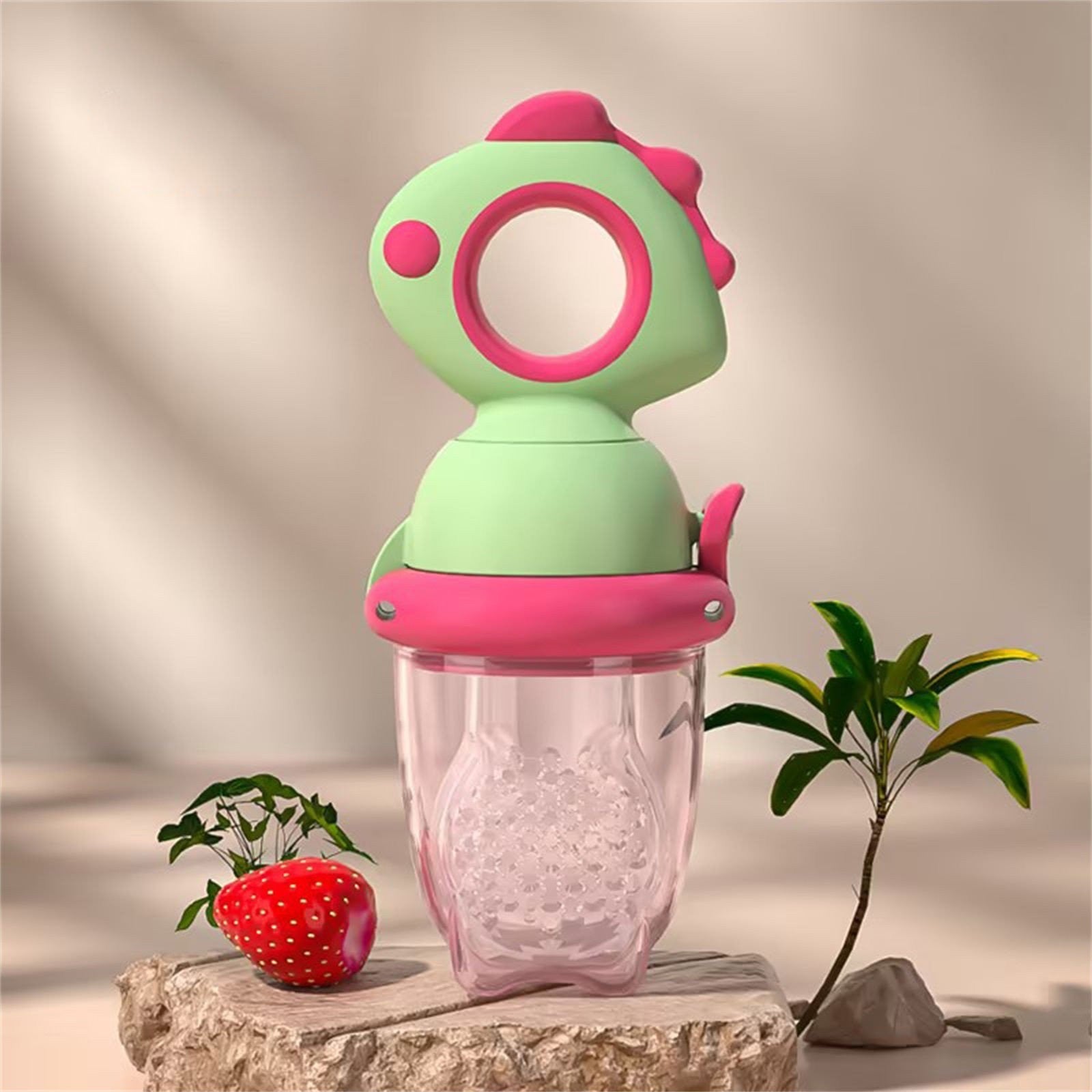 Suzetă alimentară din silicon pentru fructe – 4+ luni, găuri mici, verde-fucsia